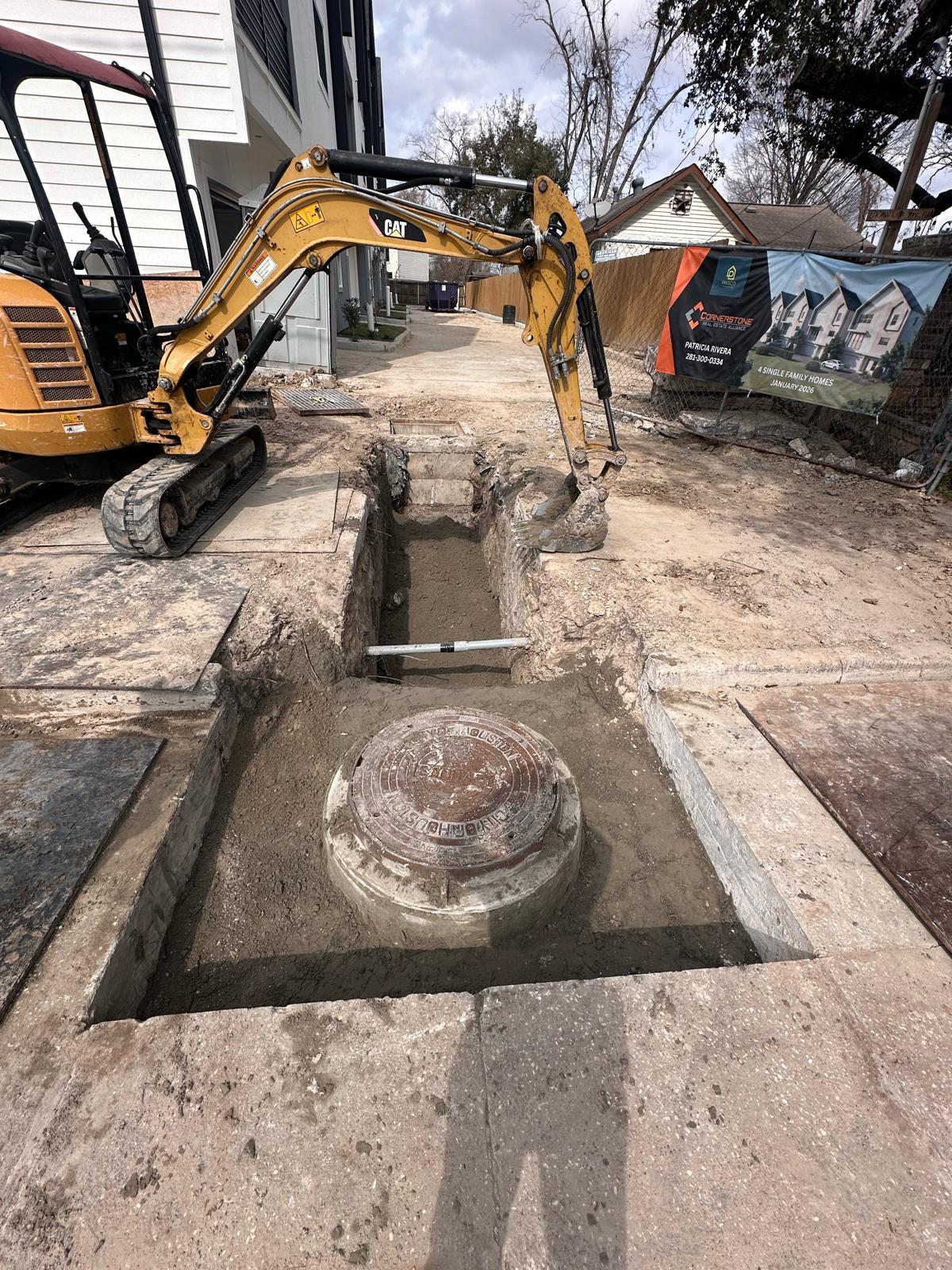 CAT Excavator Urban Utility Work